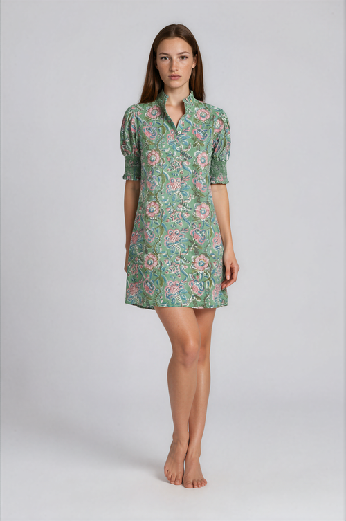 Woman wearing a floral dress on a white background