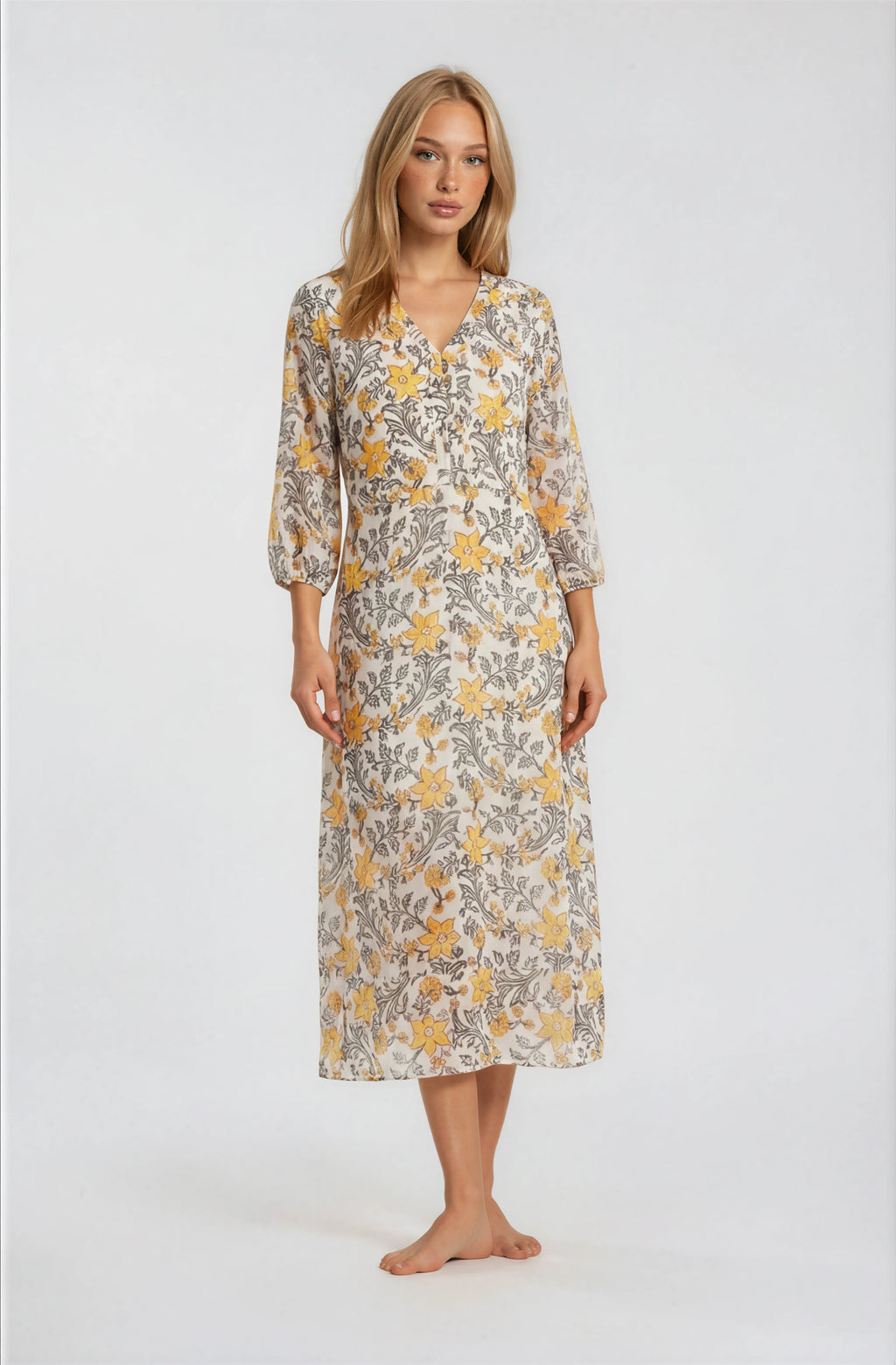 Woman wearing a floral dress on a white background